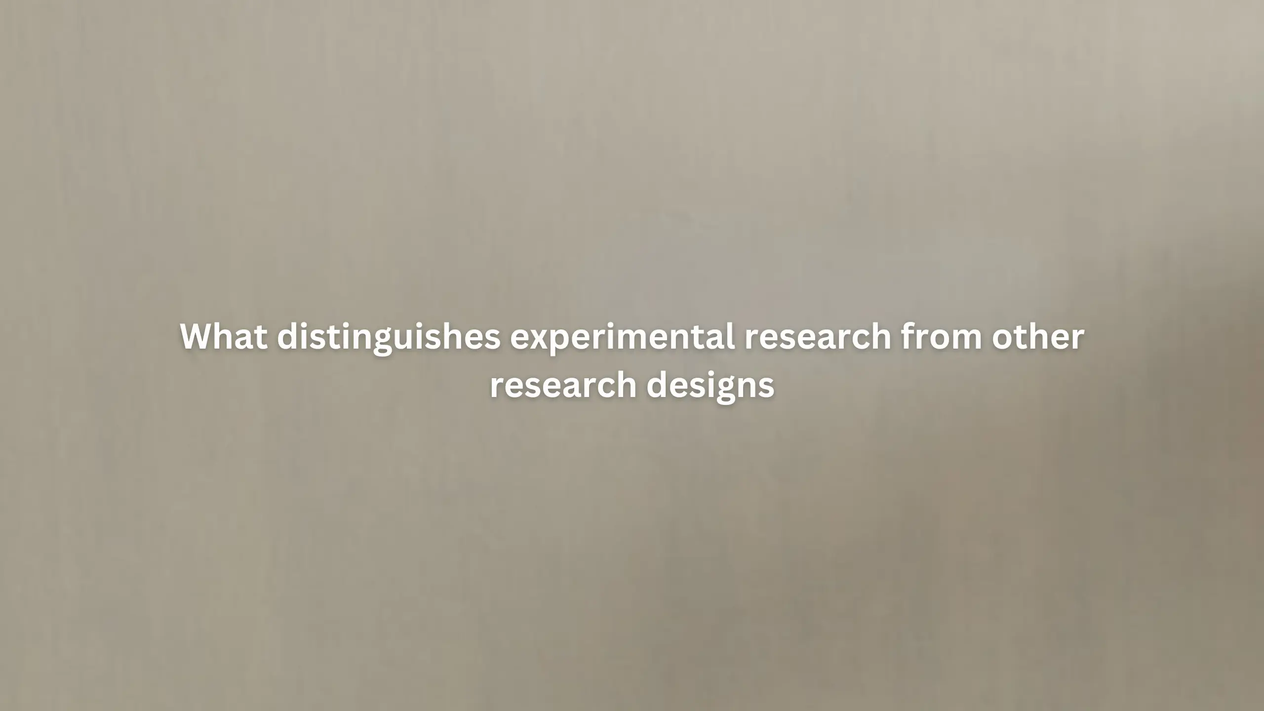 What distinguishes experimental research from other research designs?