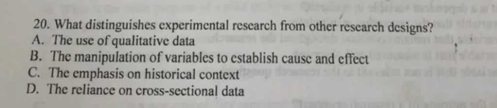 What distinguishes experimental research from other research designs
