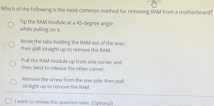 Which of the following is the most common method for removing RAM from a motherboard?